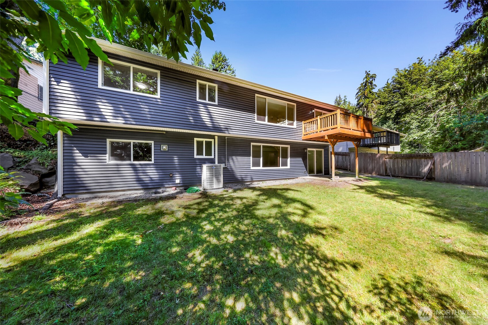 21313 2nd Drive Southeast Bothell, WA 98021 - Photo 25 of 30 a backyard of a house with yard table and chairs