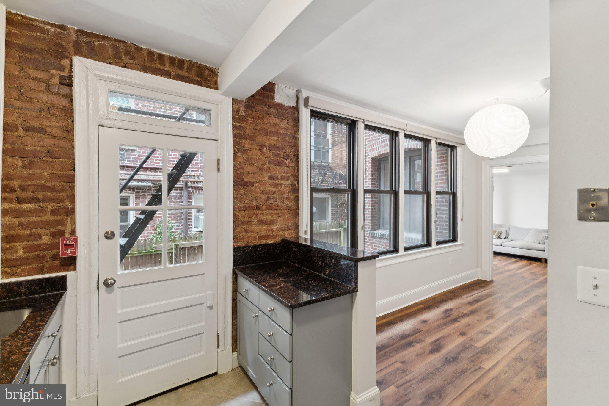 1858 California Street Northwest, Unit 5 Washington, DC 20009 - Photo 13 of 26 Charming urban kitchen with character.