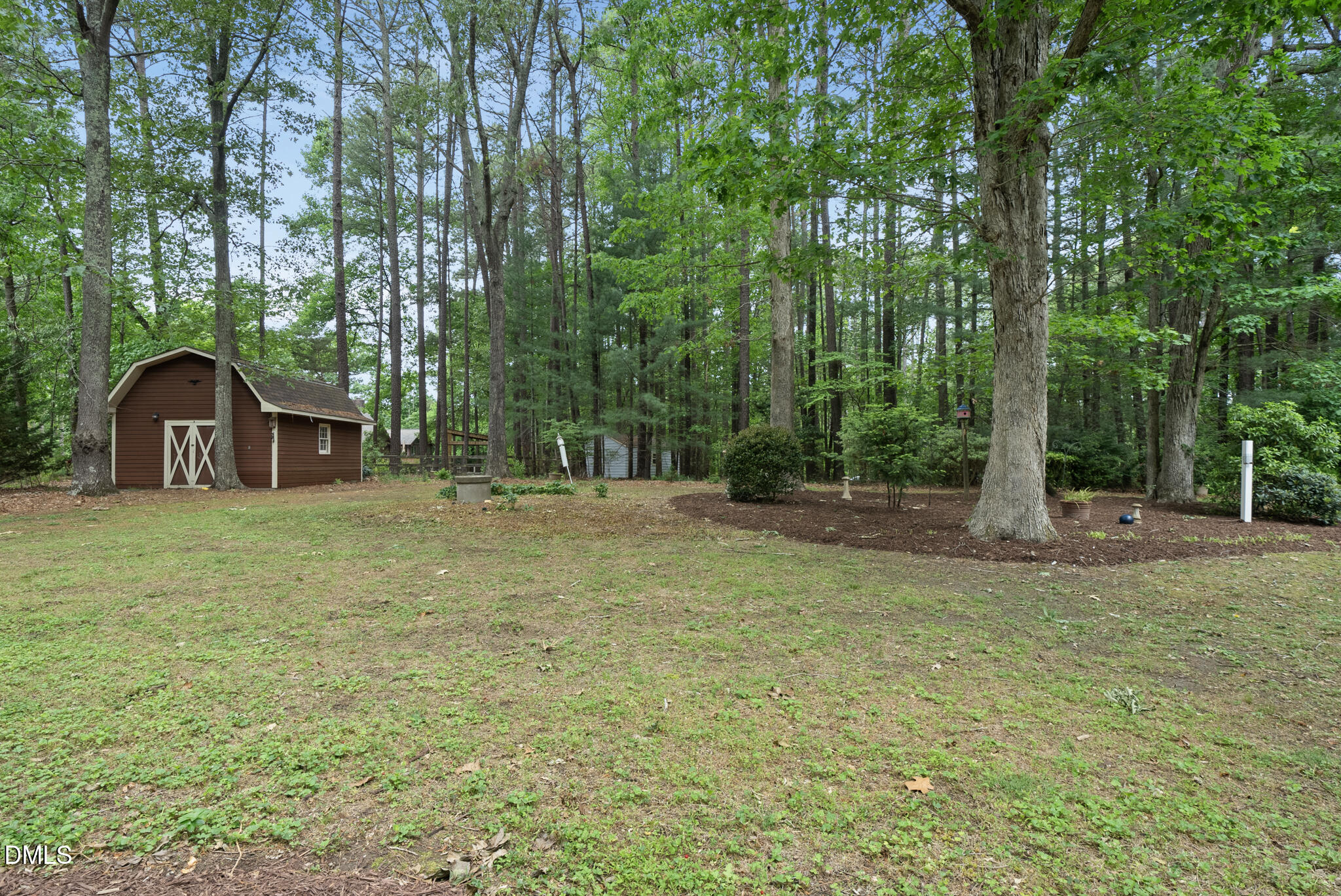 3404 Timberwood Court Raleigh, NC 27606 - Photo 32 of 45 a house view with a garden space