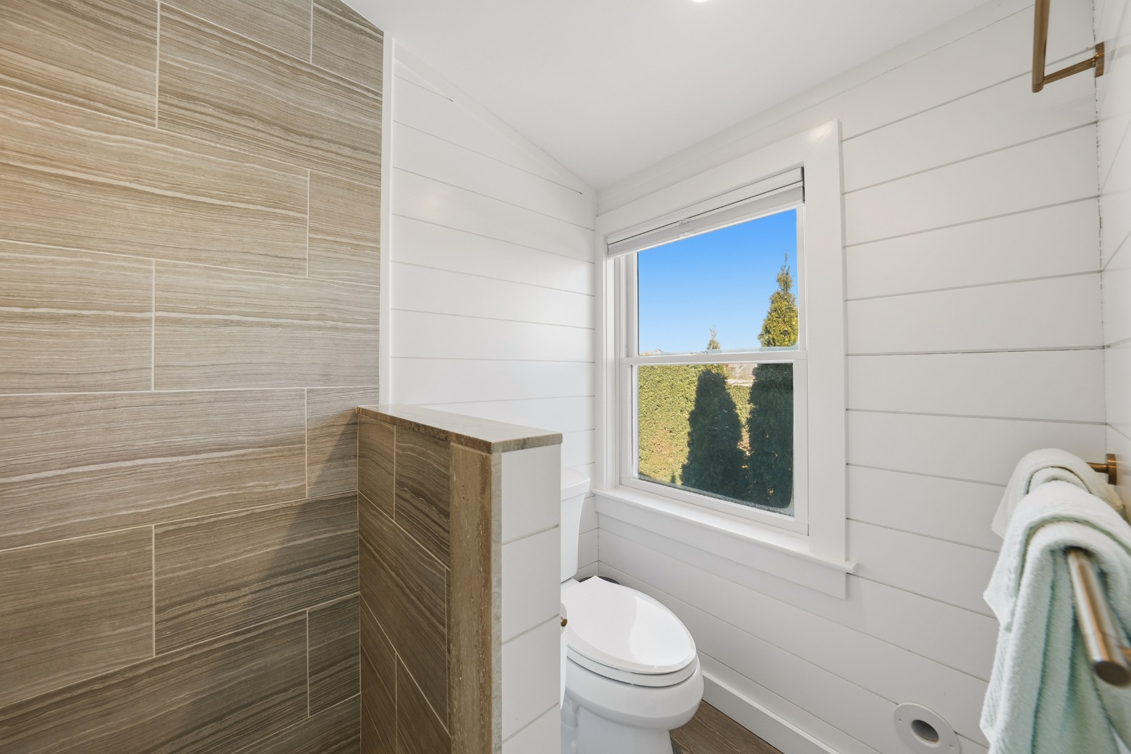 10 Pilgrim Road Nantucket, MA 02554 - Photo 39 of 65 a bathroom with a toilet and a shower