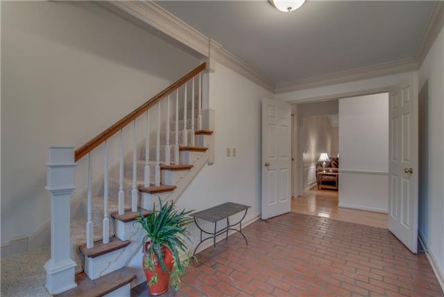 924 General George Patton Road Nashville, TN 37221 - Photo 3 of 20 Unique brick flooring add to the charm of this adorable home!