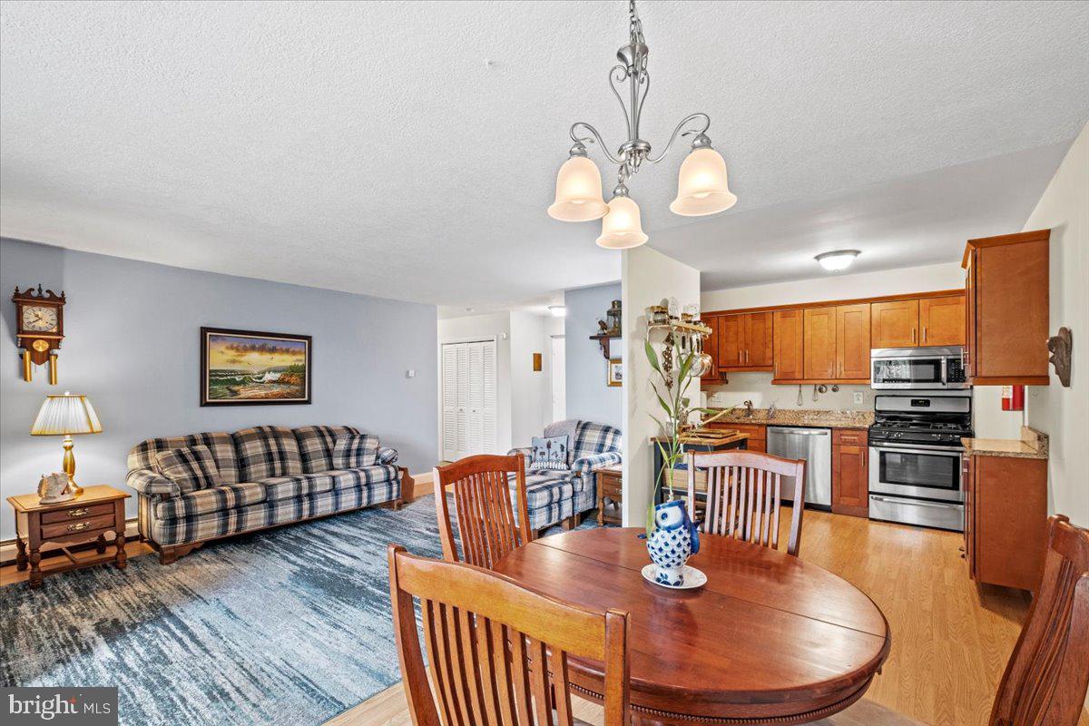 201 Cuthbert Boulevard, Unit D50 Haddon Township, NJ 08107 - Photo 11 of 46 Open Living, Dining & Kitchen