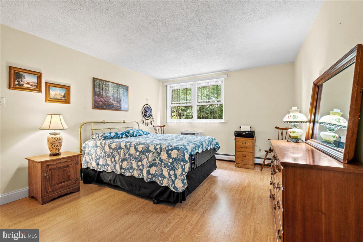 201 Cuthbert Boulevard, Unit D50 Haddon Township, NJ 08107 - Photo 23 of 46 Primary Bedroom