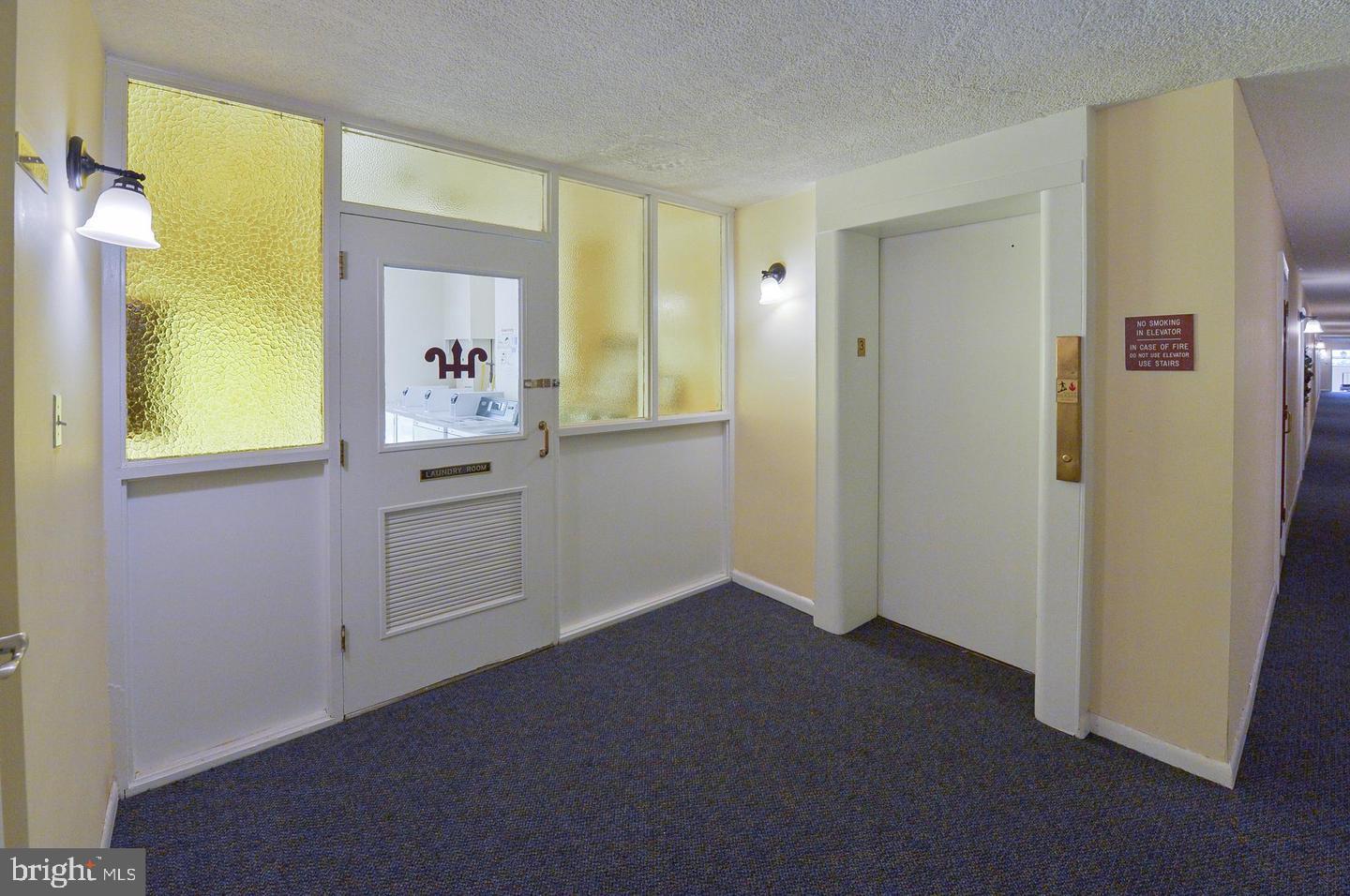 201 Cuthbert Boulevard, Unit D50 Haddon Township, NJ 08107 - Photo 34 of 46 Elevator & Entrance to Laundry