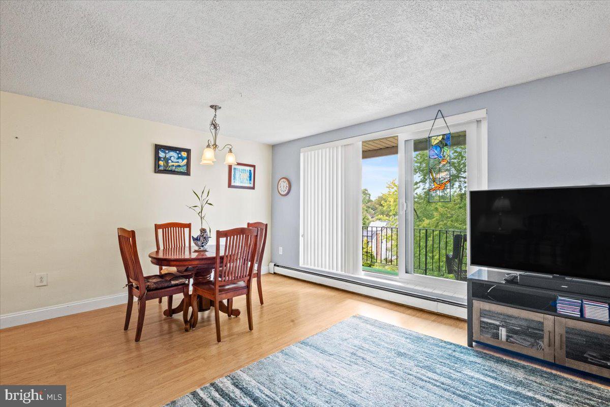 201 Cuthbert Boulevard, Unit D50 Haddon Township, NJ 08107 - Photo 7 of 46 Living Room View to Dining Room