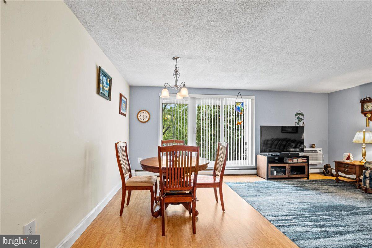 201 Cuthbert Boulevard, Unit D50 Haddon Township, NJ 08107 - Photo 8 of 46 Dining Room with view to Living Room
