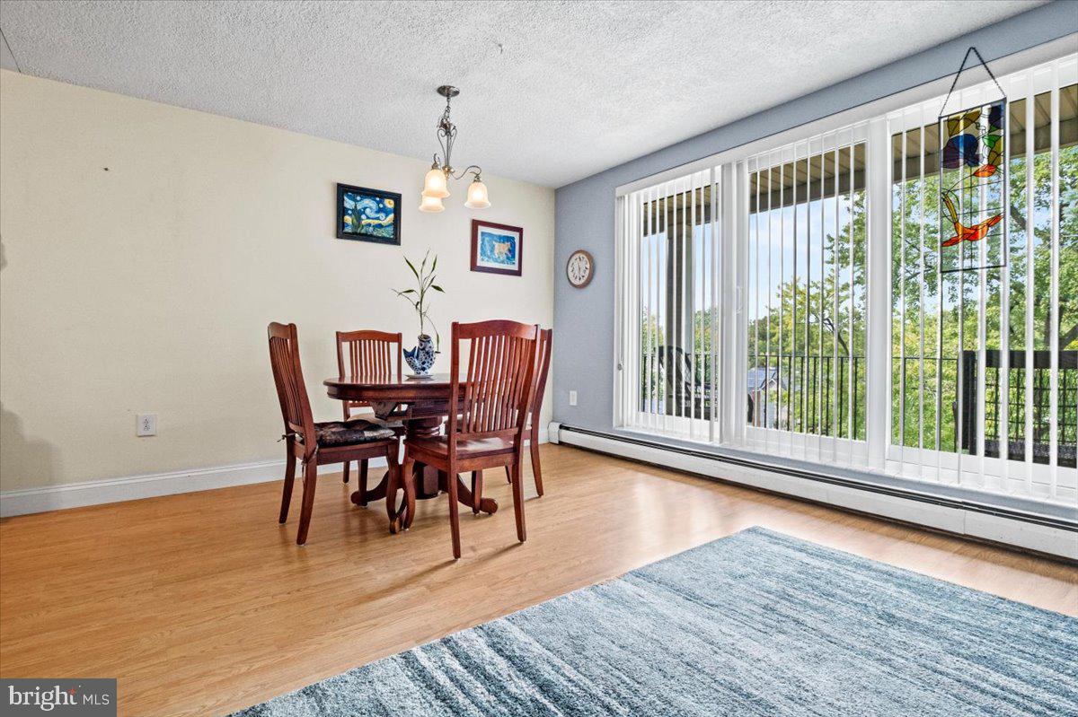 201 Cuthbert Boulevard, Unit D50 Haddon Township, NJ 08107 - Photo 9 of 46 Dining Room with a Balcony View