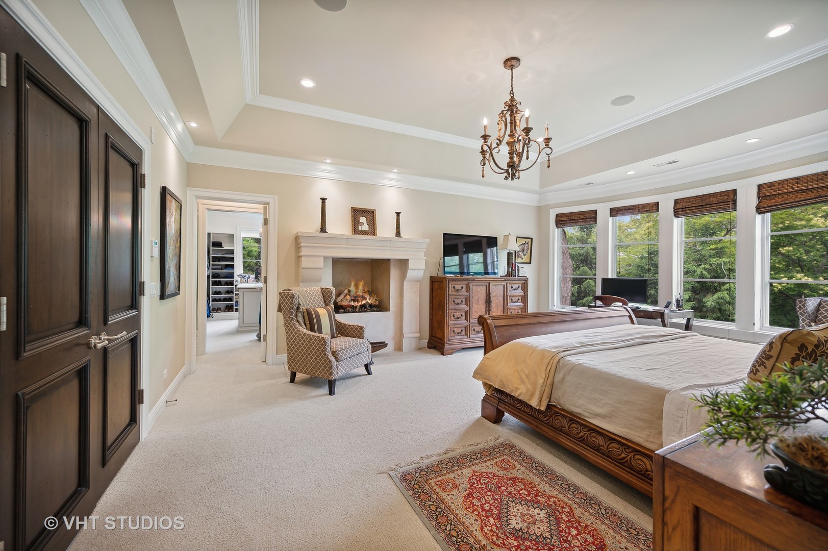 555 Sheridan Road Glencoe, IL 60022 - Photo 16 of 27 a bed room with a bed and a fireplace