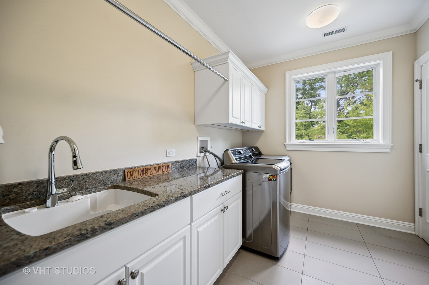 555 Sheridan Road Glencoe, IL 60022 - Photo 21 of 27 a kitchen with a sink and cabinets