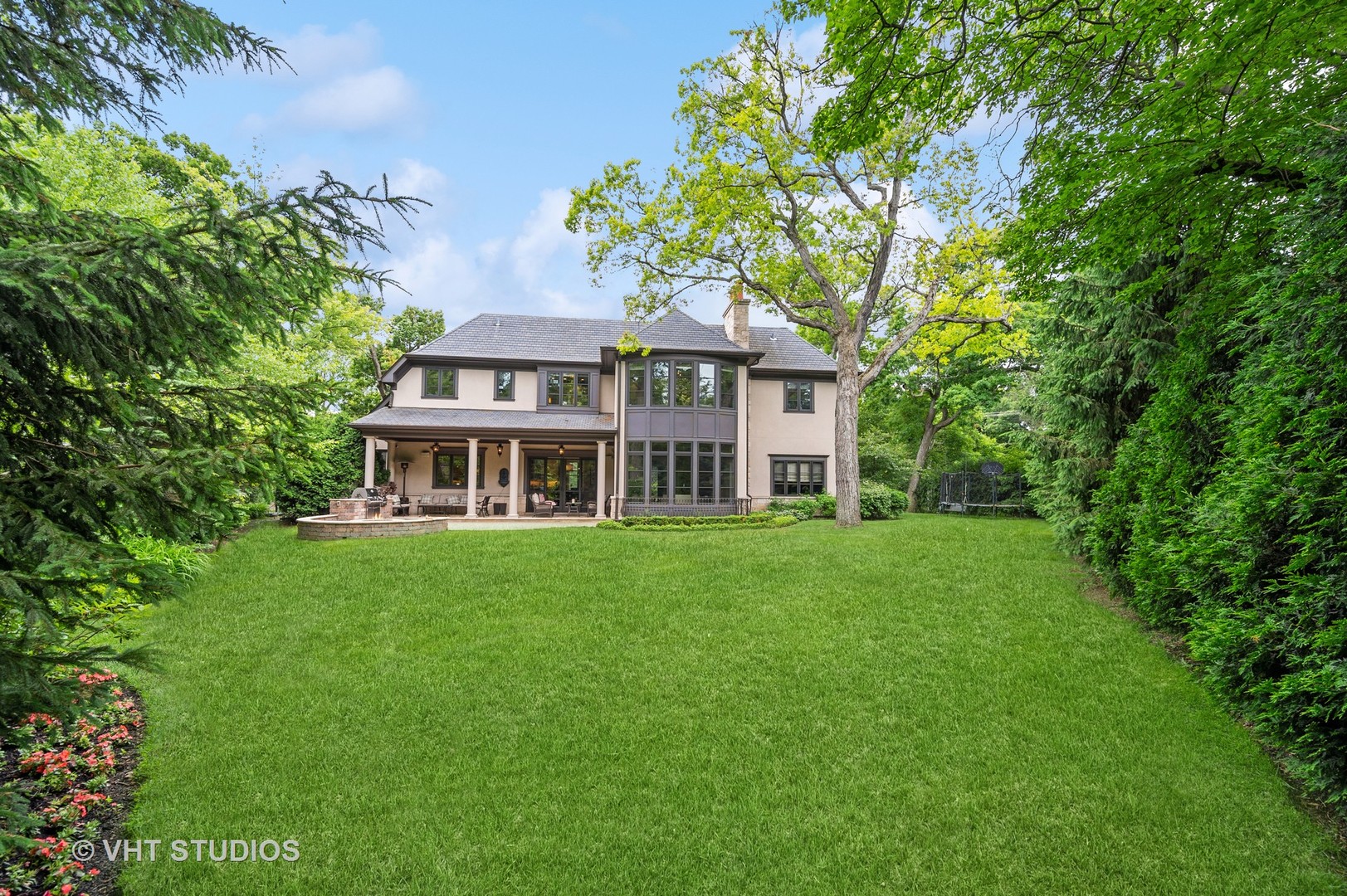 555 Sheridan Road Glencoe, IL 60022 - Photo 26 of 27 a view of a house with a big yard and large trees