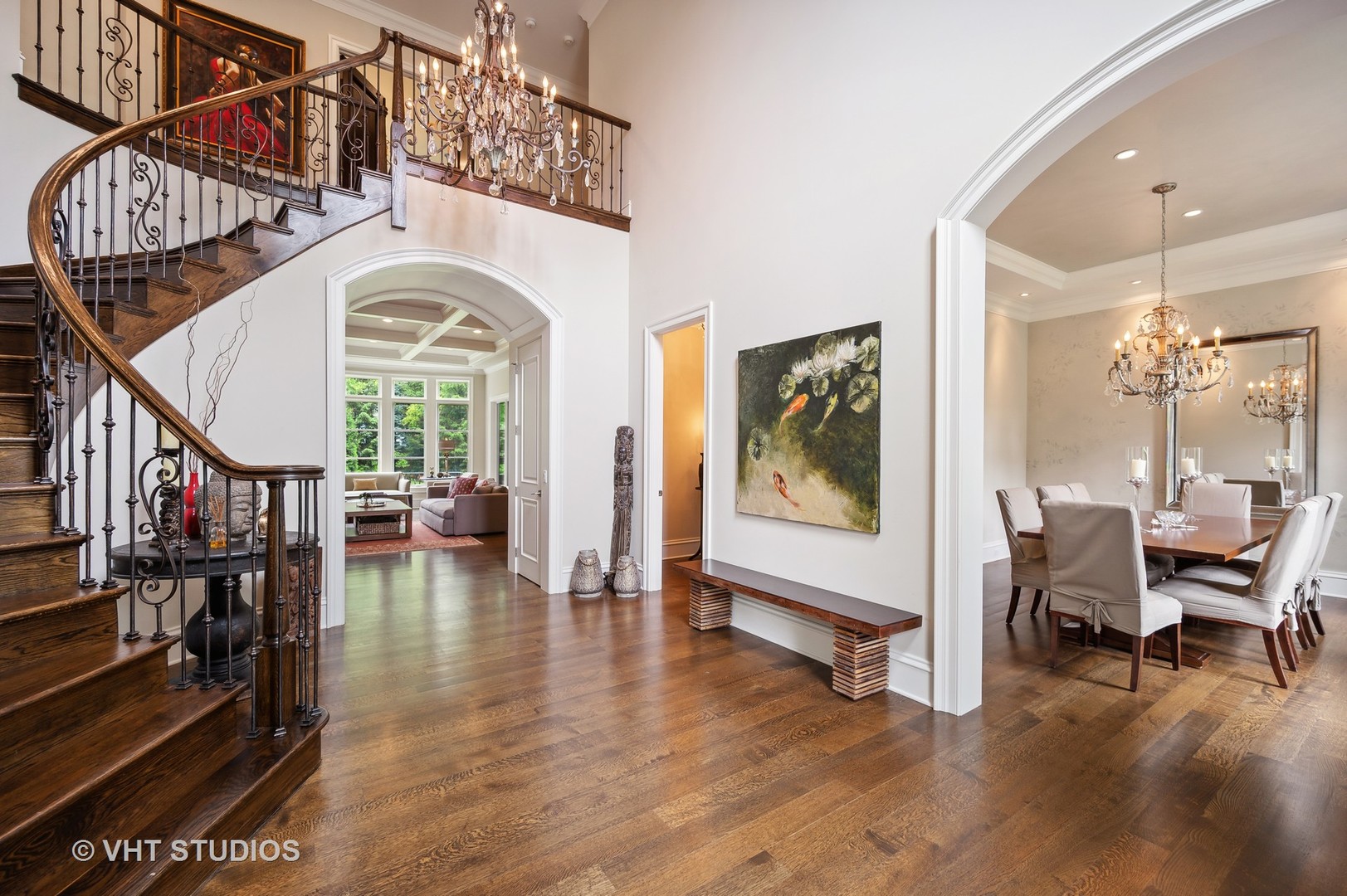 555 Sheridan Road Glencoe, IL 60022 - Photo 4 of 27 a view of a livingroom with furniture wooden floor windows and a chandelier