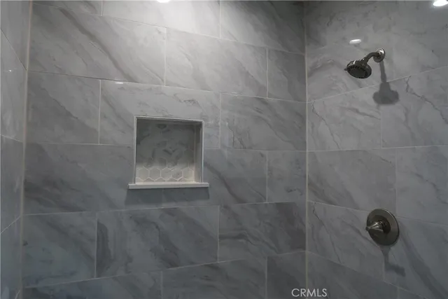 a kitchen with white cabinets