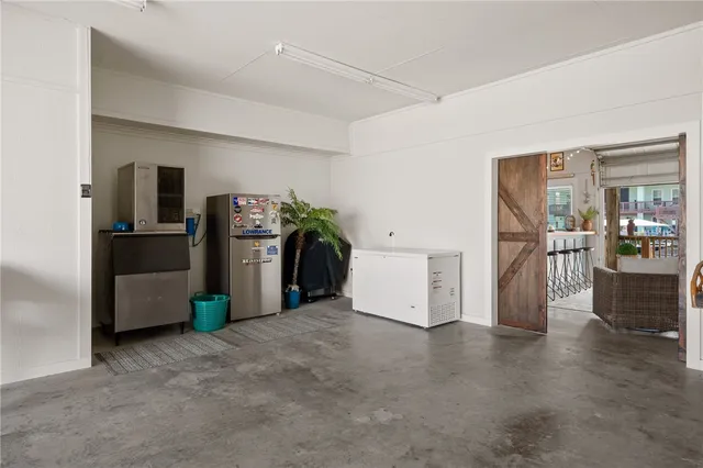 a view of a kitchen and a sink