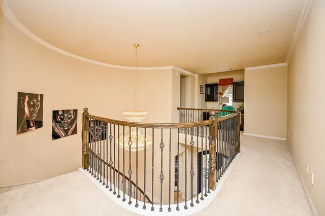 a view of a hallway with a bedroom