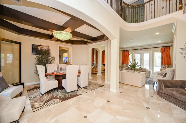 a view of a livingroom with furniture and windows