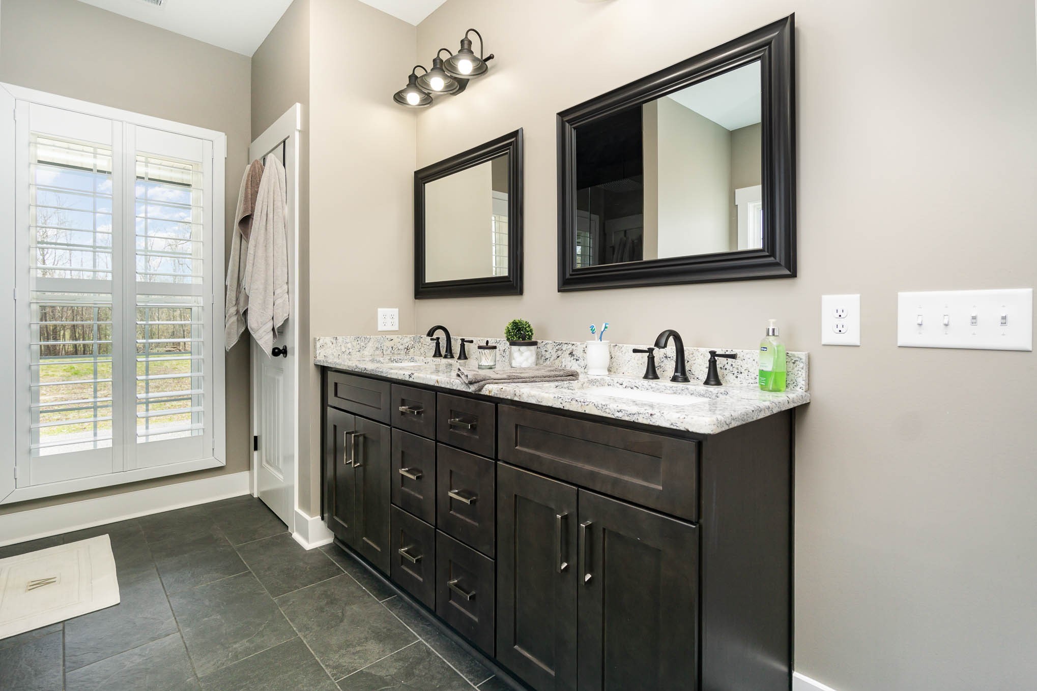 129 Claypool Road Bethpage, TN 37022 - Photo 17 of 30 a bathroom with a double vanity sink mirror and