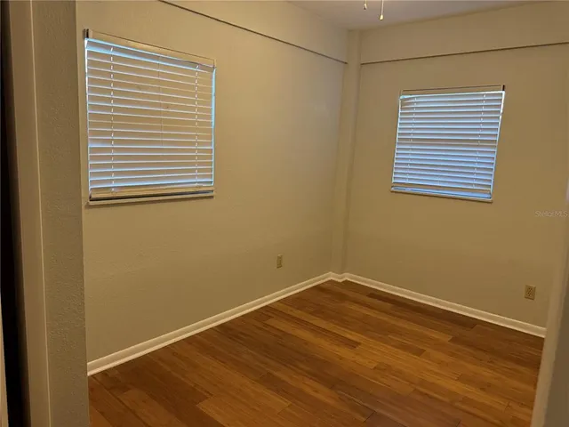 a view of a room that has a window in it