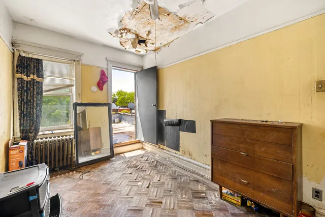 a view of a hallway with a chandelier