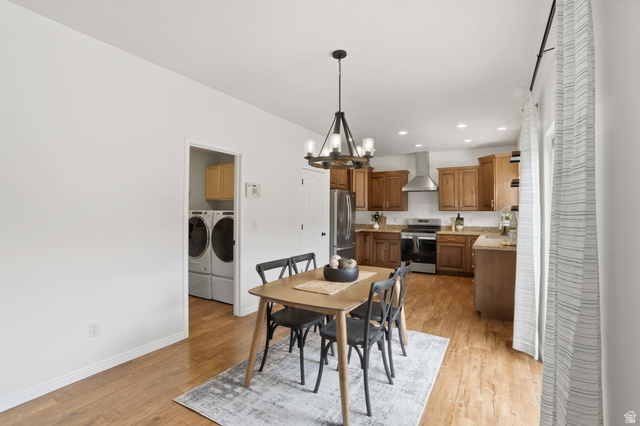 2007 Fielding Hill Lane Draper, UT 84020 - Photo 15 of 83 Kitchen and dining area featuring wood-finish flooring, recessed lighting, and a modern chandelier