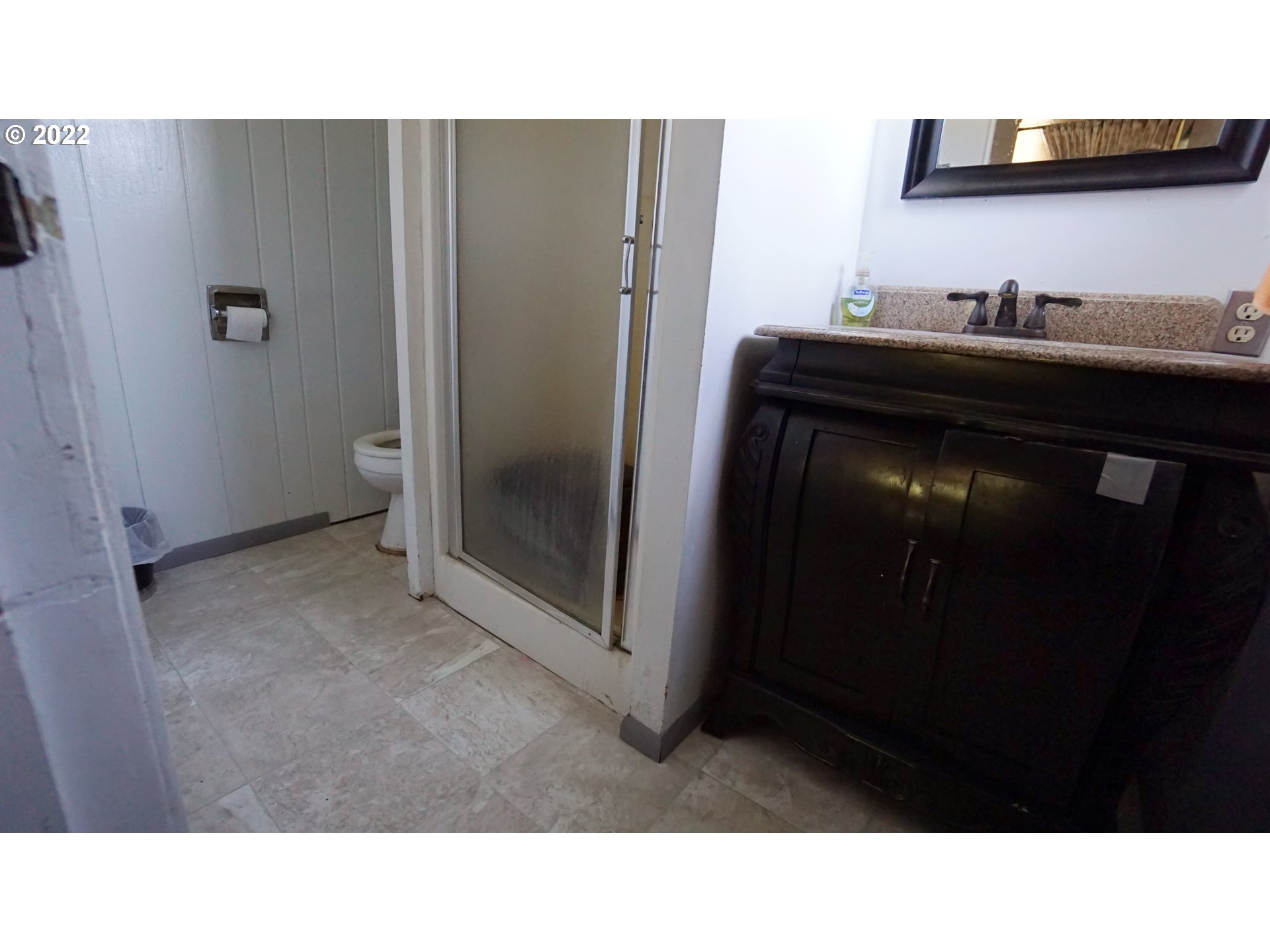 13054 Dominic Road Northeast Mount Angel, OR 97362 - Photo 11 of 32 a bathroom with a sink and a mirror