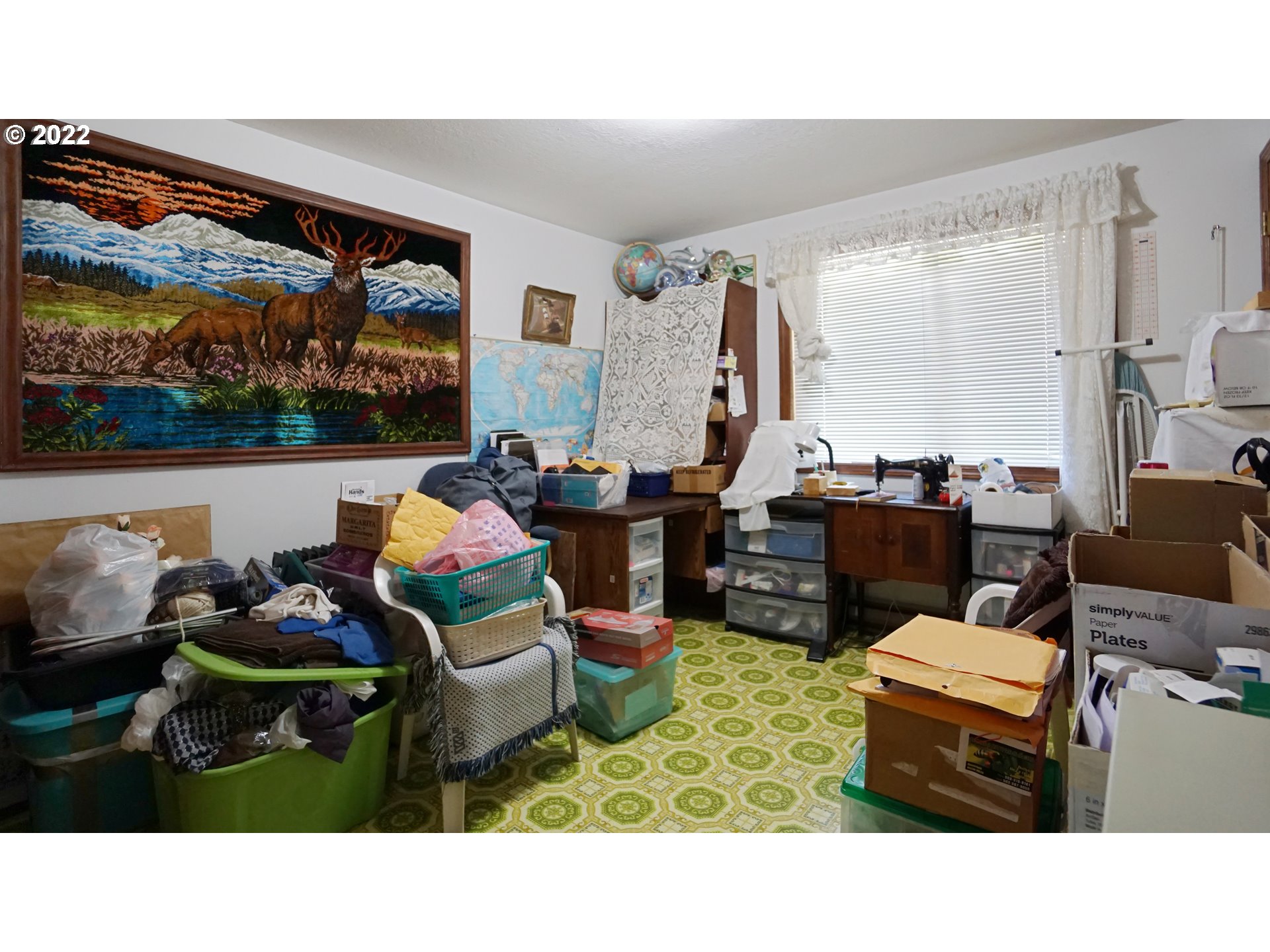 13054 Dominic Road Northeast Mount Angel, OR 97362 - Photo 21 of 32 a living room with furniture and a flat screen tv