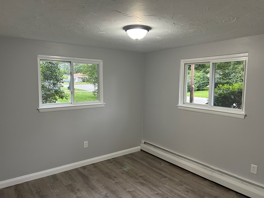 73 Brooks Street Maynard, MA 01754 - Photo 13 of 17 an empty room with a window