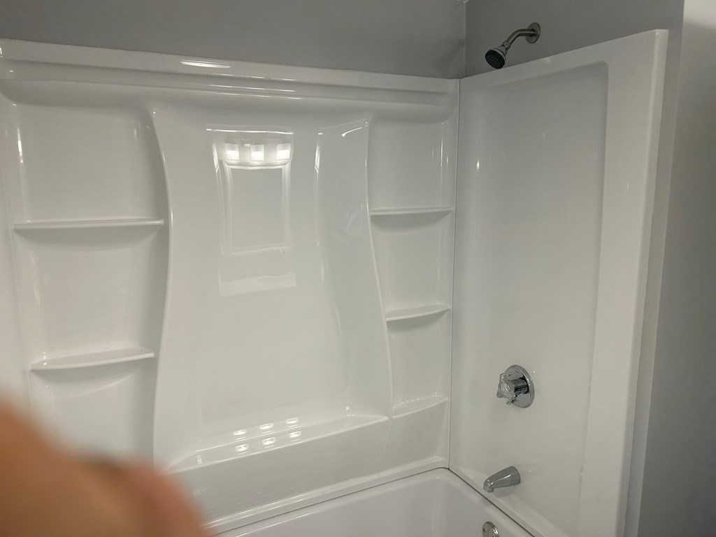 73 Brooks Street Maynard, MA 01754 - Photo 10 of 17 a bathroom with a glass shower door