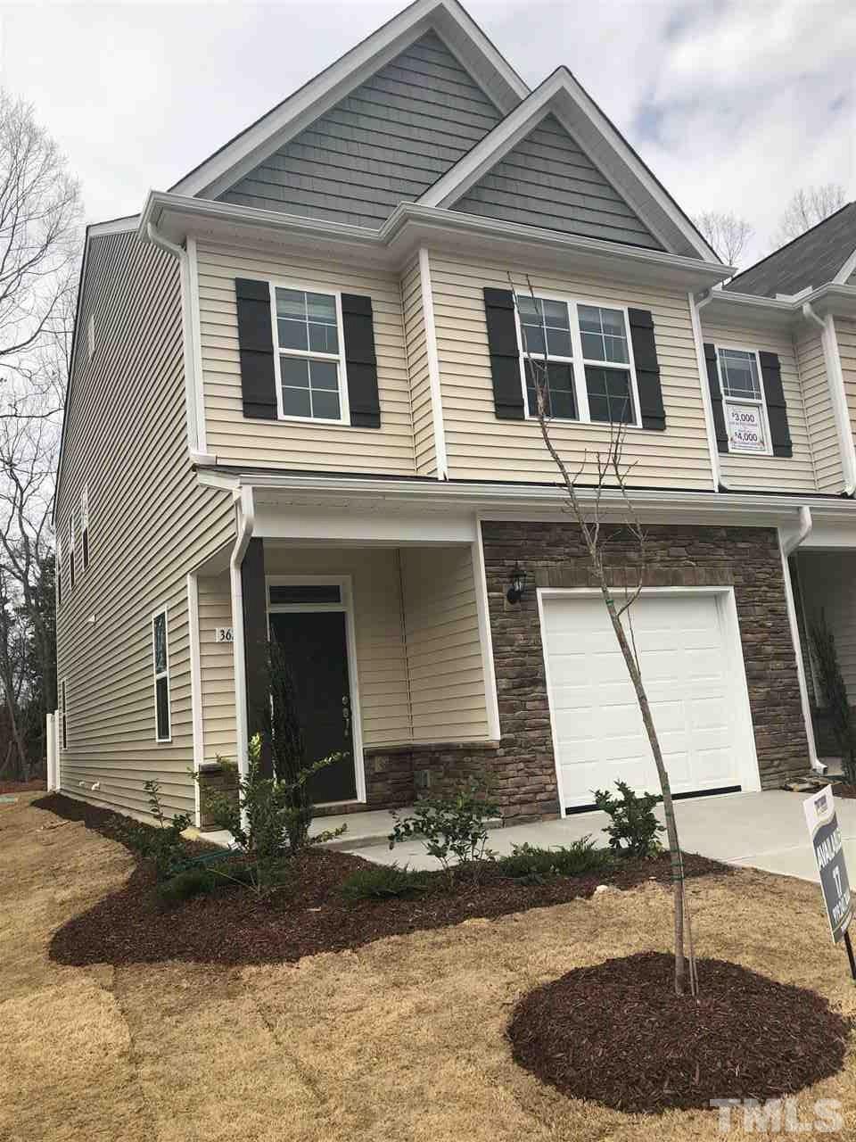 3627 Water Mist Lane, Unit 17 Raleigh, NC 27604 - Photo 1 of 17 a front view of a house