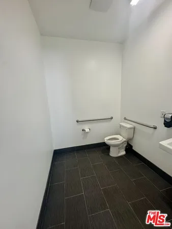 a bathroom with a toilet