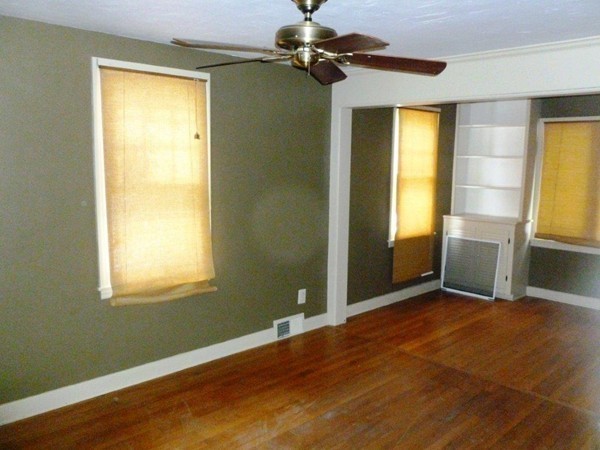 84 Mayflower Road Springfield, MA 01118 - Photo 7 of 14 a view of empty room with window and wooden floor