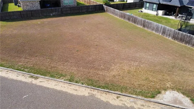 a view of swimming pool from a balcony