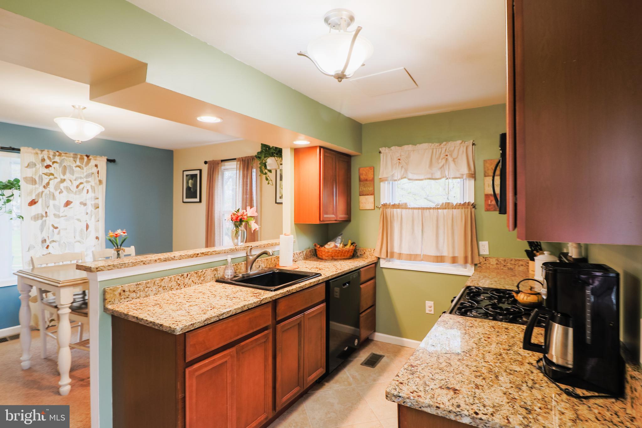 635 Beechwood Road Willow Grove, PA 19090 - Photo 7 of 29 KITCHEN W/ OPENING TO DINING ROOM
