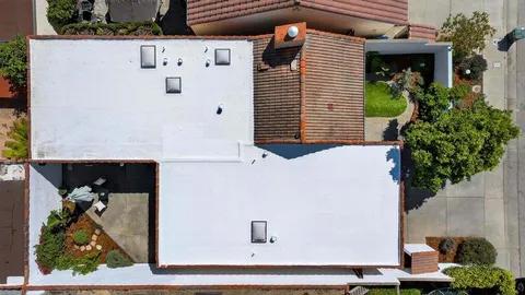 an aerial view of residential building and city view