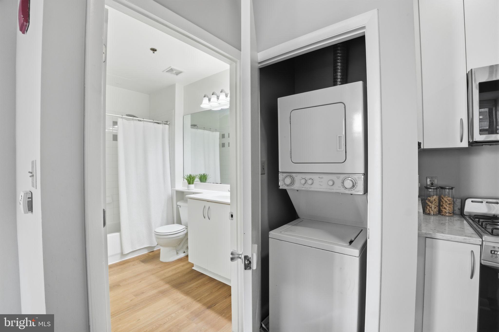 1300 N Street Northwest, Unit 207 Washington, DC 20005 - Photo 19 of 24 a bathroom with a toilet and a sink