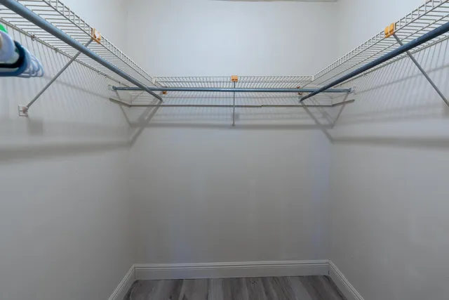 a view of a room with racks on the wall