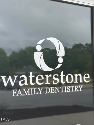 a blue sign that has a sign on it