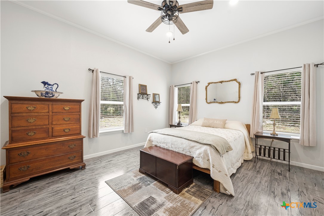 351 Line Camp Loop Spring Branch, TX 78070 - Photo 9 of 27 a bedroom with a bed and a window