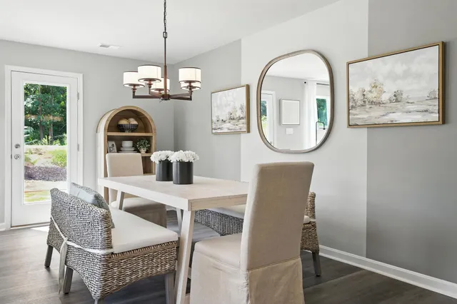 a bathroom with a sink mirror and toilet