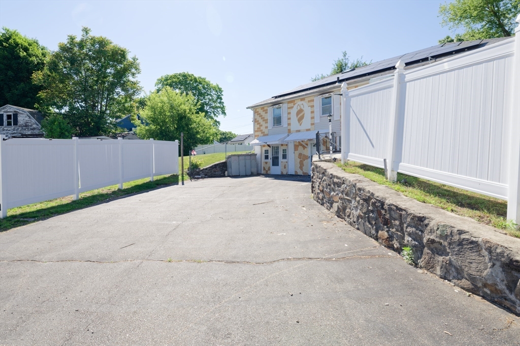 1 Rockland Rd Court Auburn, MA 01501 - Photo 36 of 38 a view of a house with a yard and potted plants