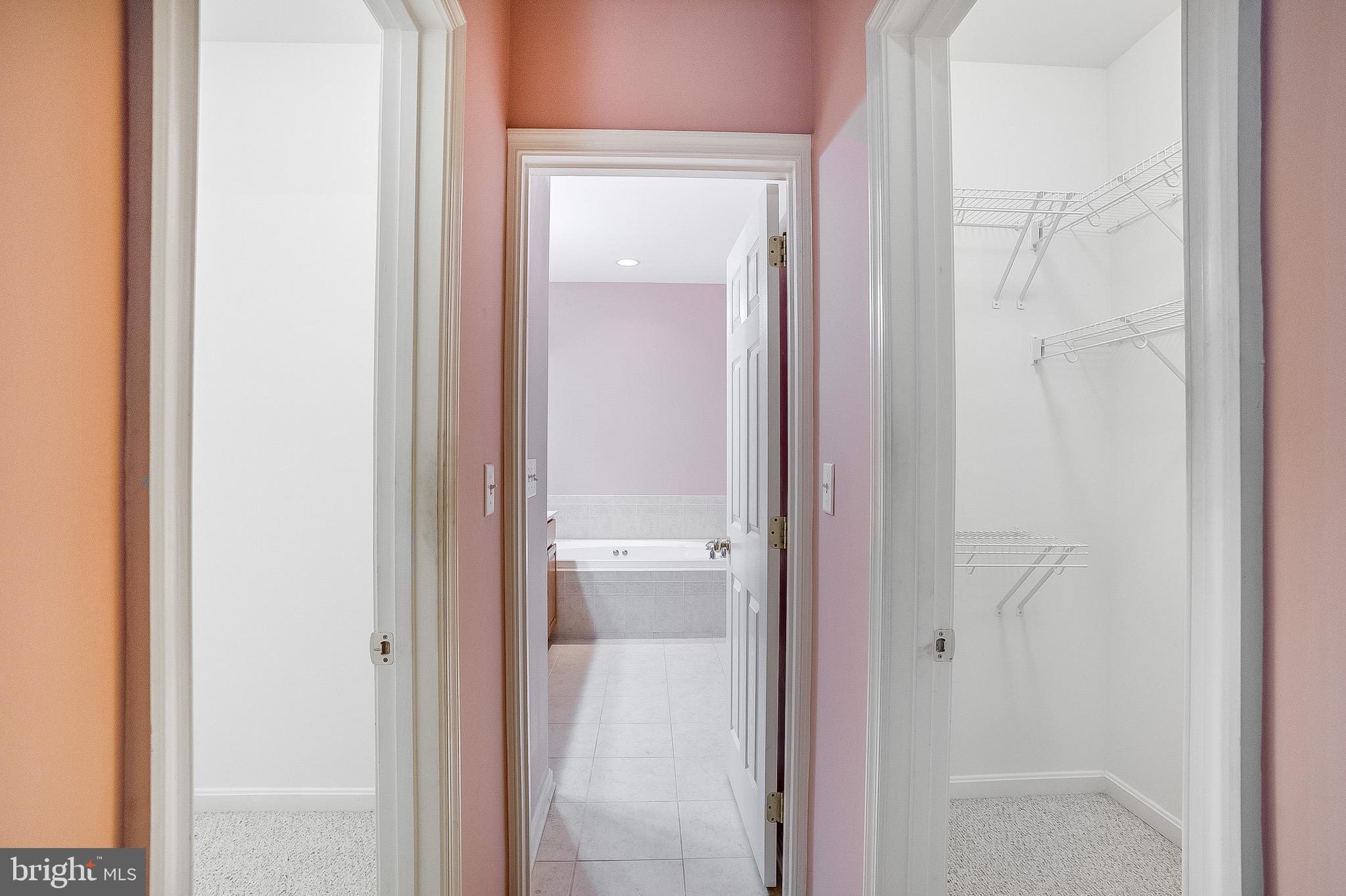 35141 Country Walk Delmar, DE 19940 - Photo 17 of 33 a view of a bathroom from a hallway with toilet