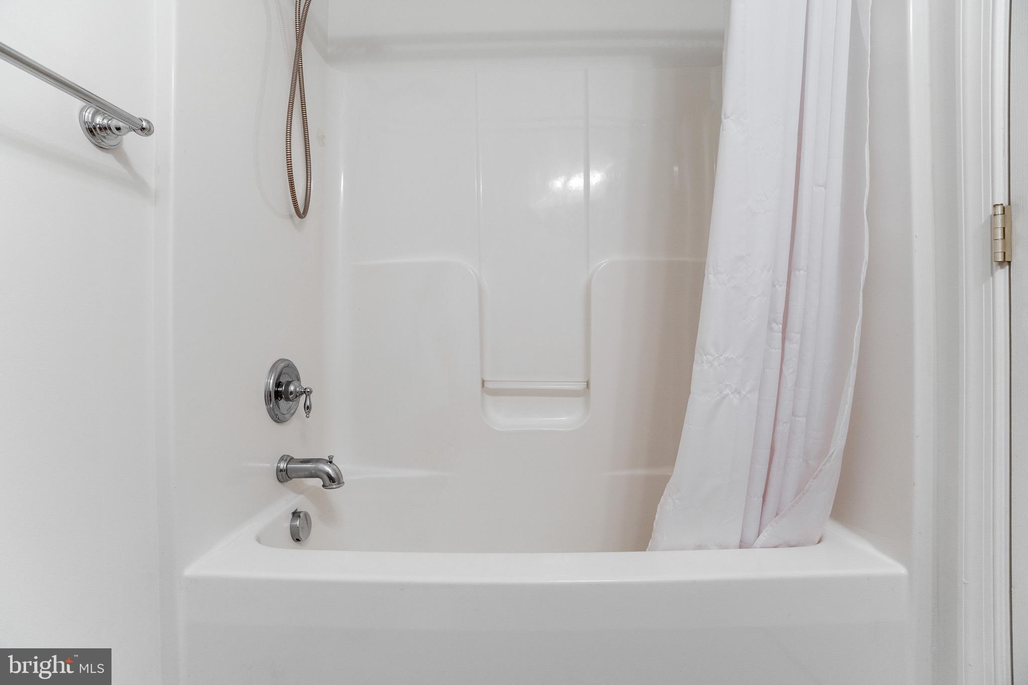 35141 Country Walk Delmar, DE 19940 - Photo 25 of 33 a bathroom with a bathtub