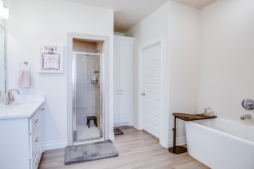 5701 119th Street Lubbock, TX 79424 - Photo 12 of 22 a bathroom with a sink and a mirror