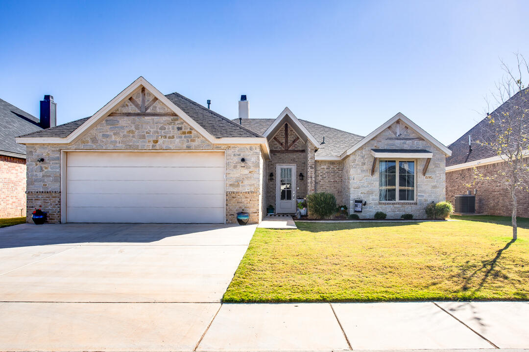 5701 119th Street Lubbock, TX 79424 - Photo 2 of 22 a view of house with yard
