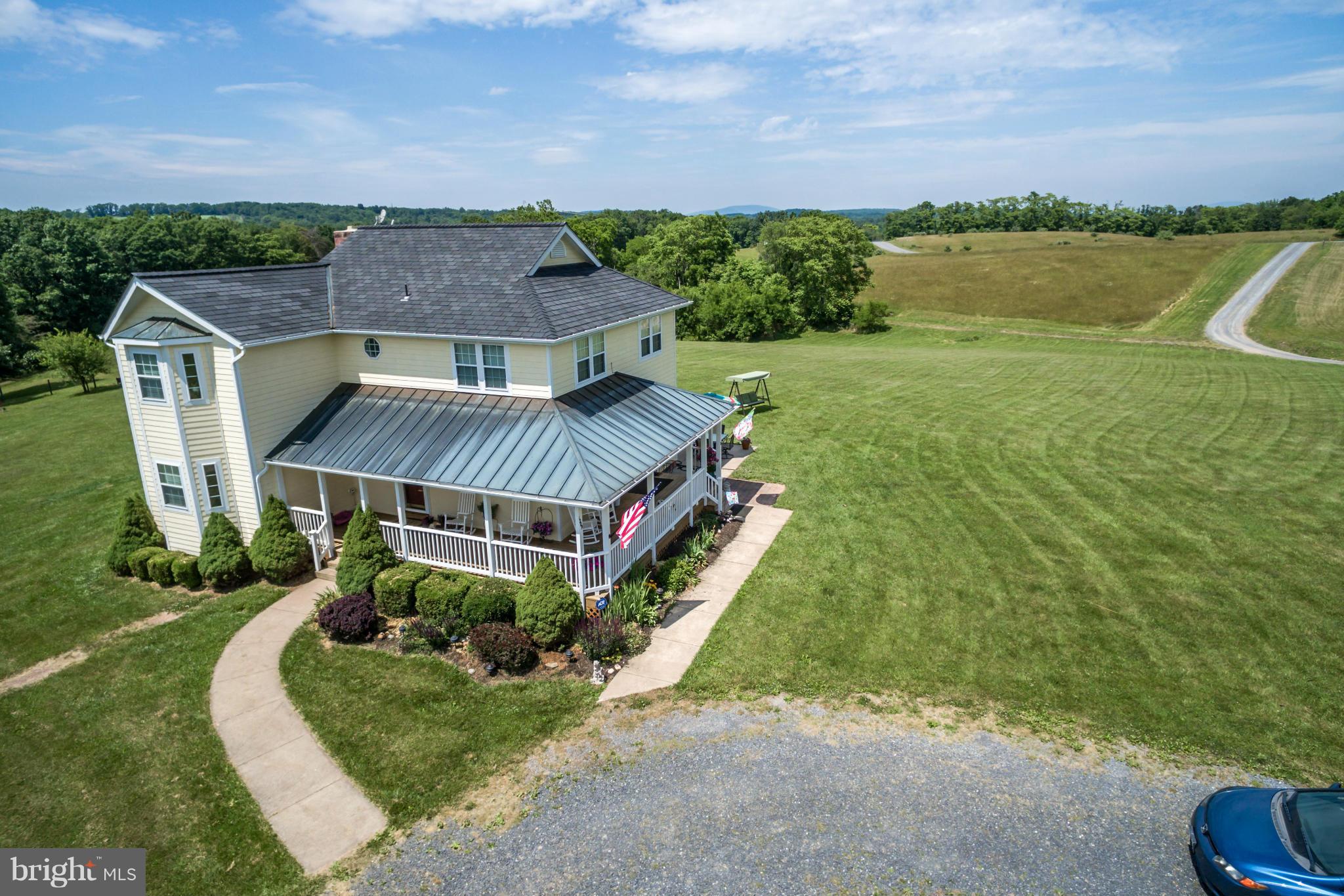 1209 Hollow Road Gore, VA 22637 - Photo 1 of 30 an aerial view of a house with a garden and lake view