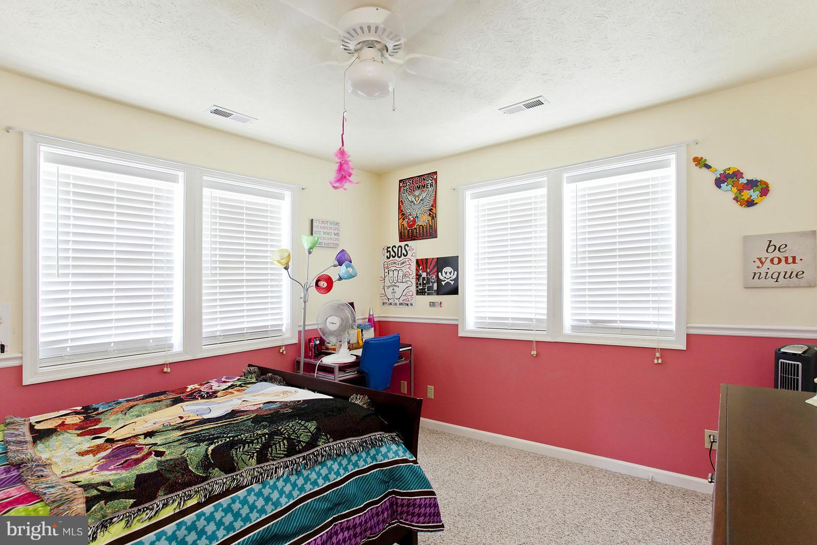 1209 Hollow Road Gore, VA 22637 - Photo 21 of 30 a bed room with furniture and a window