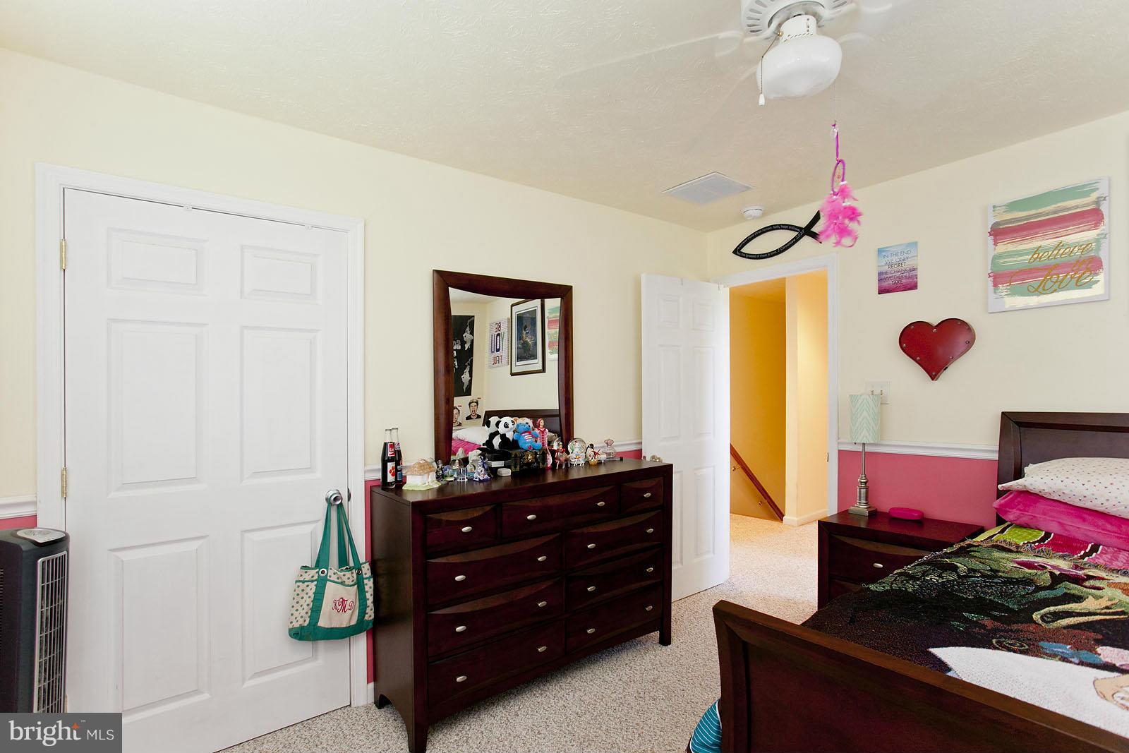 1209 Hollow Road Gore, VA 22637 - Photo 22 of 30 a living room with furniture and a dresser