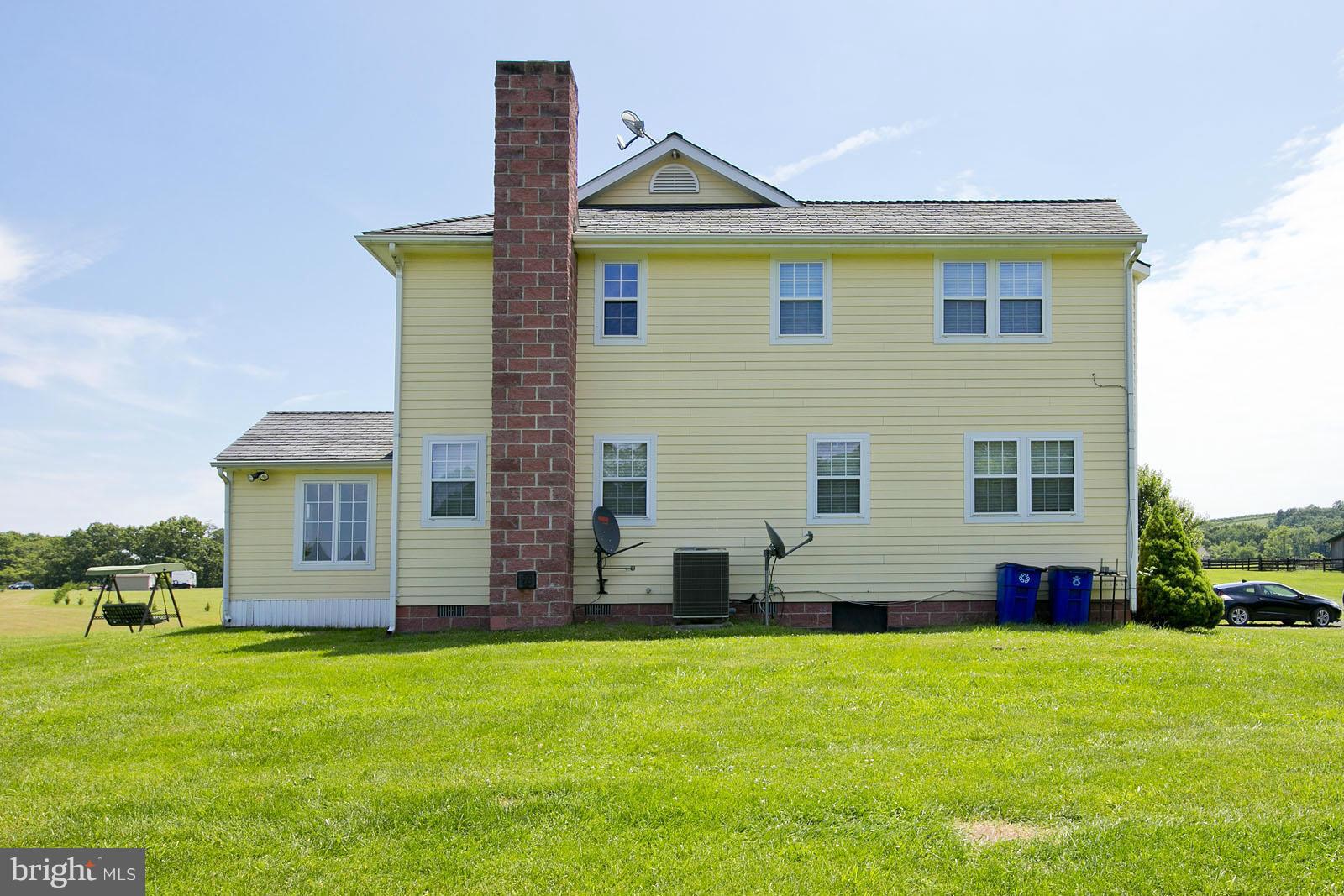 1209 Hollow Road Gore, VA 22637 - Photo 26 of 30 a view of a house with a backyard