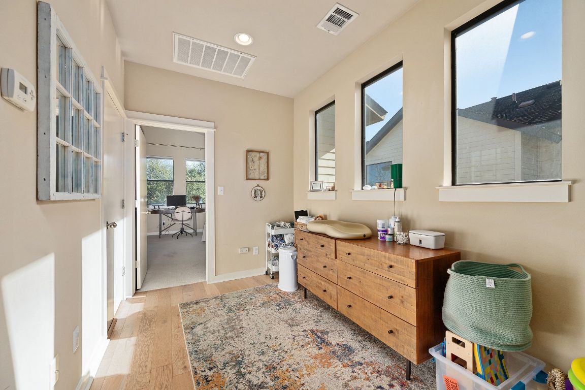 2819 Corbin Lane Austin, TX 78704 - Photo 11 of 22 a room with furniture and a window