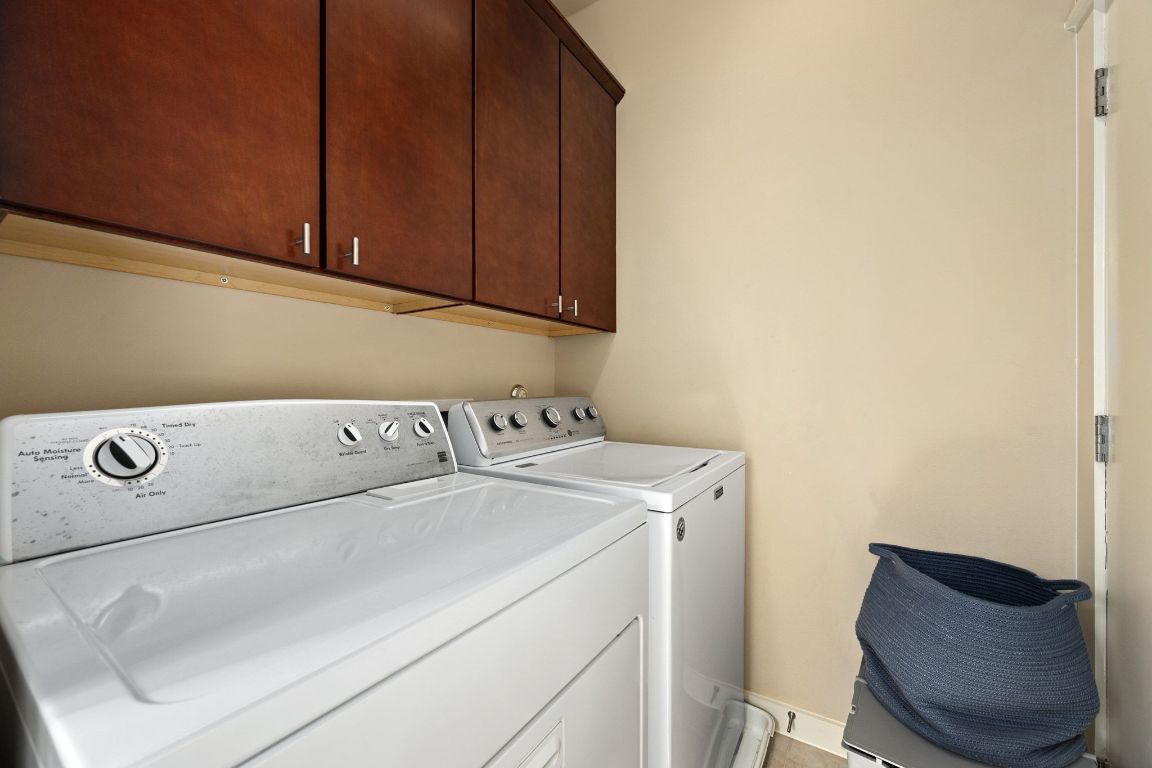 2819 Corbin Lane Austin, TX 78704 - Photo 18 of 22 a utility room with dryer and washer