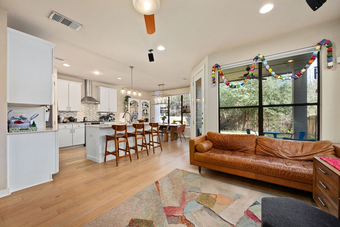 2819 Corbin Lane Austin, TX 78704 - Photo 6 of 22 a living room with furniture and a large window
